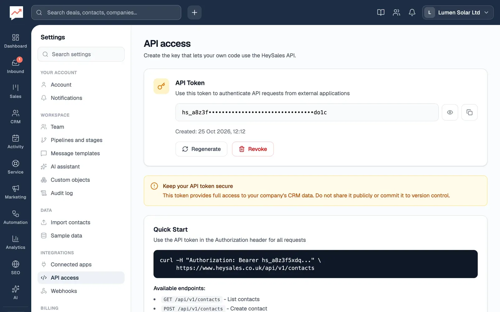 The API access page: the company's API token, hidden apart from its first and last characters, with buttons to show it, copy it, regenerate it and revoke it, a warning to keep it secure, and a quick start example below.