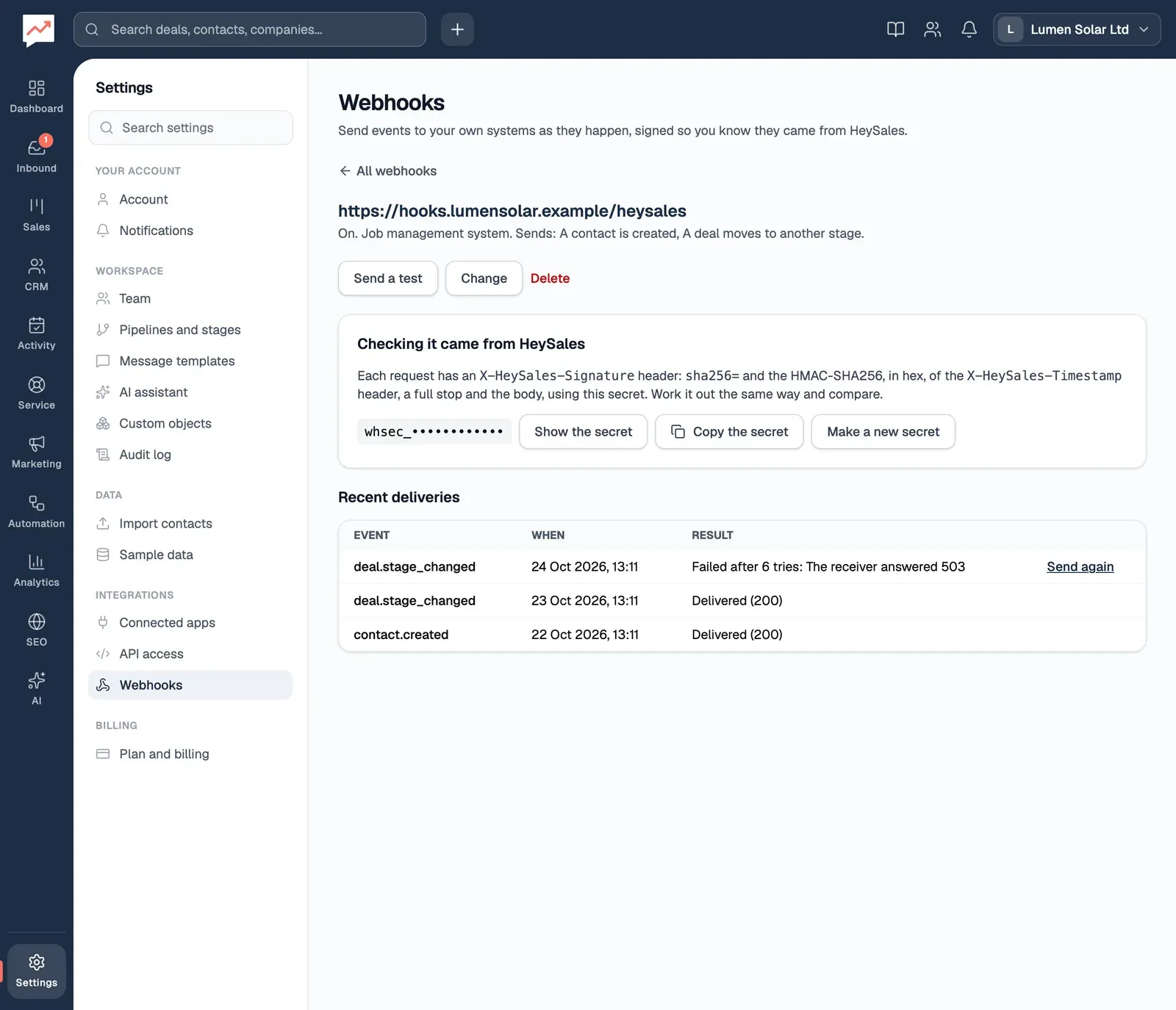 The webhook for the job management system: it's on and sends new contacts and deal stage changes. Below are buttons to send a test, change or delete it, the hidden signing secret, and a table of recent deliveries, two delivered and one that failed with a 503.